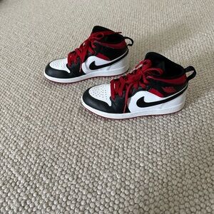 Nike Jordan Kids Black, White, and Red Sneakers